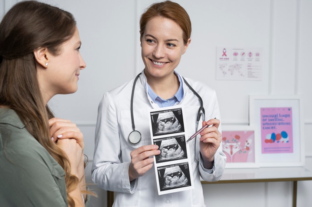 Doctor explaining an ultrasound during a patient consultation