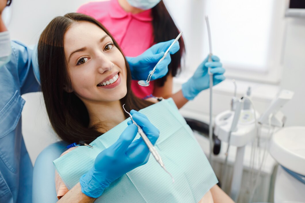 Smiling woman sitting in a dentist chair