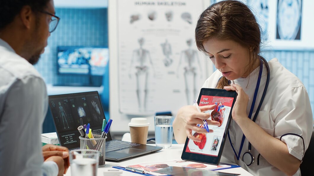 Cardiology specialist explaining heart function test results to a patient
